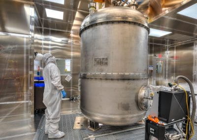 A photo of LZ's inner cryostat standing in the surface lab cleanroom at SURF.